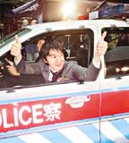 Stephen in police car
